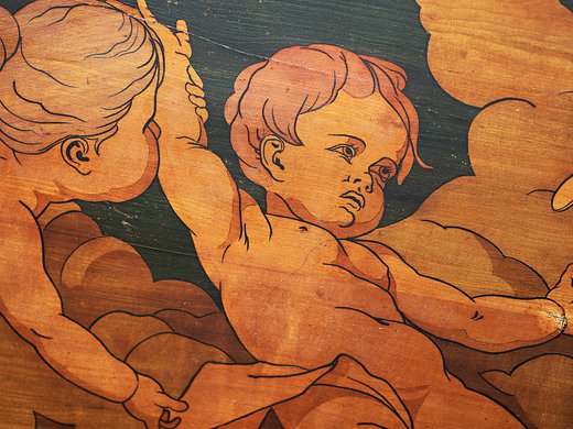 Hotel Böhlerstern: your conference hotel in Styria Close-up of wooden artwork depicting two cherubs and clouds